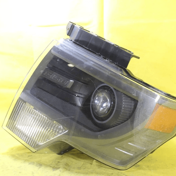 Used 2015 Ford F150 Headlight Assembly LH Driver Side at BackToRoad Auto Parts