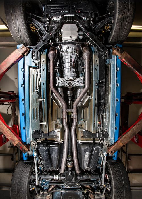 bottom view of a car showing newly installed used steering knuckle from BackToRoad Auto Parts