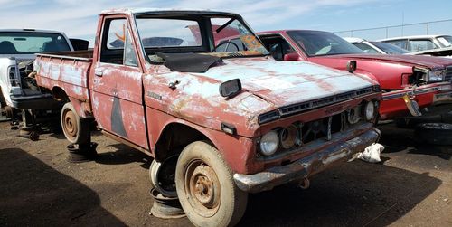 Toyota Hilux in BackToRoad Junkyard